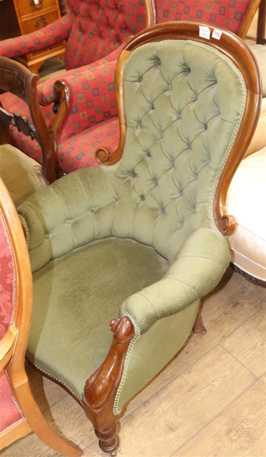 A Victorian mahogany framed buttoned back spoonback armchair